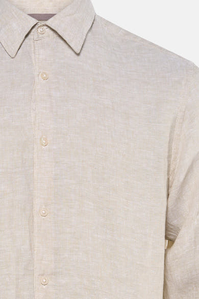 Chemise écrue de PREMIUM by JACK & JONES en tissu texturé, avec col et boutons clairs, vue rapprochée.
