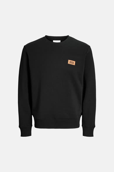Black crewneck sweatshirt by Jack & Jones with tan leather patch logo on chest, ribbed cuffs and hem, front view