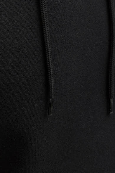 Black hooded sweatshirt with textured knit fabric and braided drawstrings, close-up front view