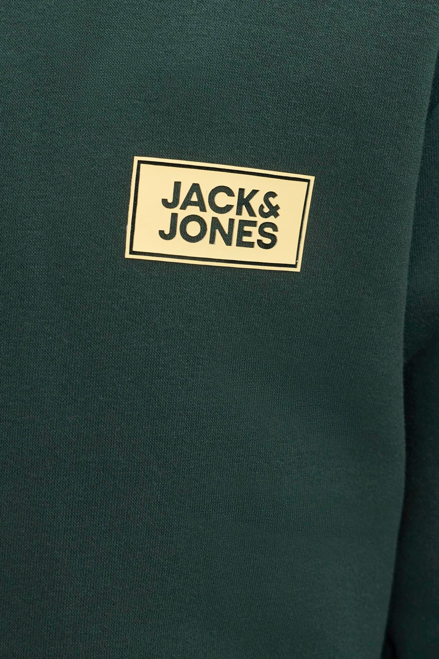 Dark green hooded sweatshirt by Jack & Jones featuring a cream-colored rectangular logo patch with black text on the chest.