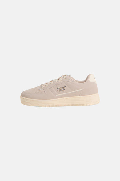 Beige suede sneakers by Jack & Jones with cream rubber sole, side logo, and lace-up front, side view