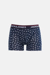 Blauwe boxer van ACCESSORIES BY JACK & JONES, versierd met witte motieven in de vorm van buldoggenkoppen en komma's.