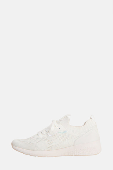 Witte Tamaris sneakers, van mesh met veters en een gestructureerde zool, zijaanzicht.