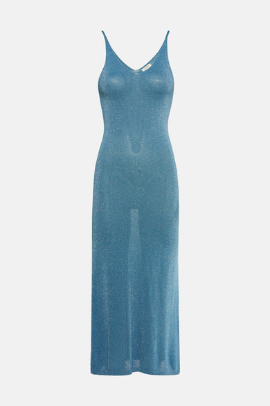 Turquoise glinsterende lange jurk van GOA GOA, aansluitend model met dunne bandjes en doorschijnende mesh.