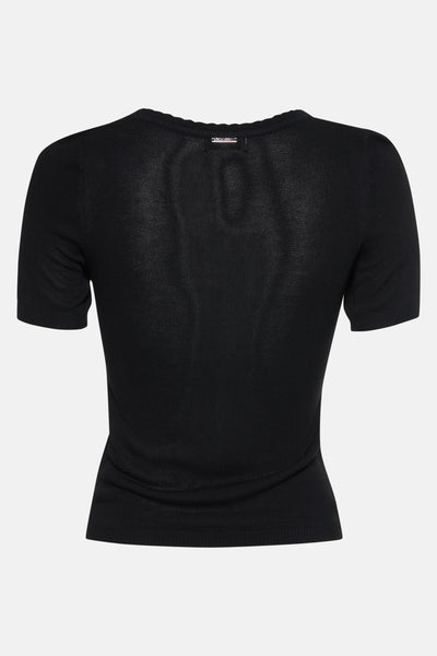Pull noir à col rond de GOA GOA, en maille fine et coupe ajustée, présenté de dos.