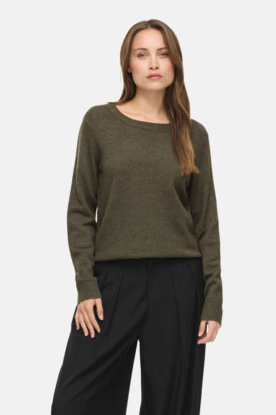 Olive green knit pullover with ribbed cuffs and boat neckline, worn with black wide-leg trousers, front view.