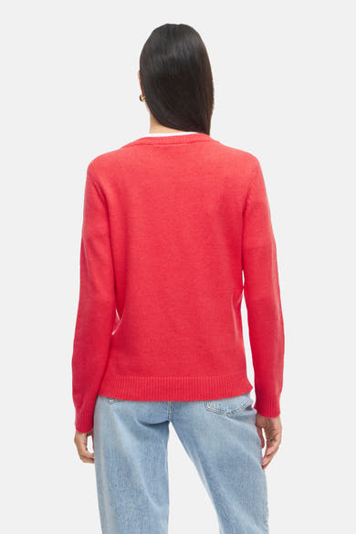 Rode coltrui van VILA®, van achteren gezien, gedragen met een lichtblauwe jeans.