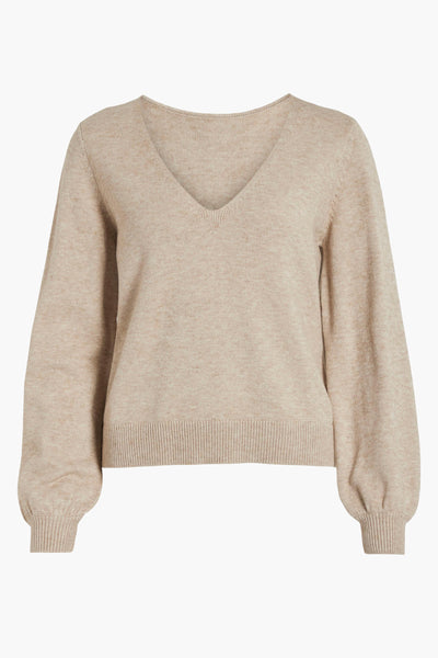 Pull beige col V par VILA®, avec des manches longues bouffantes et une texture douce.
