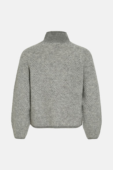 Pull à col roulé gris de VILA, avec un motif en chevron et une texture tricotée.