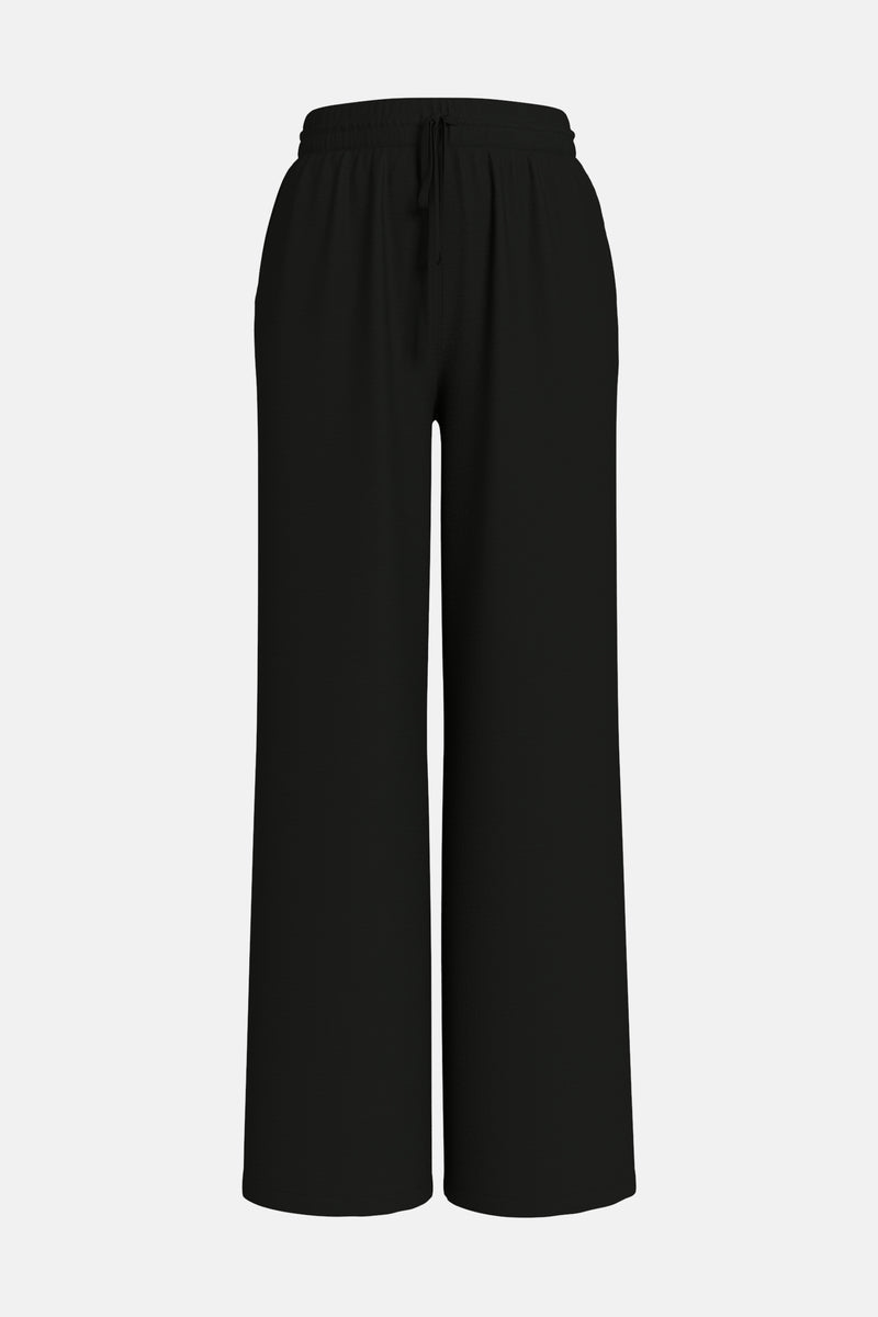 Pantalon coloré noir de VILA®, coupe ample et taille élastique avec cordon de serrage.