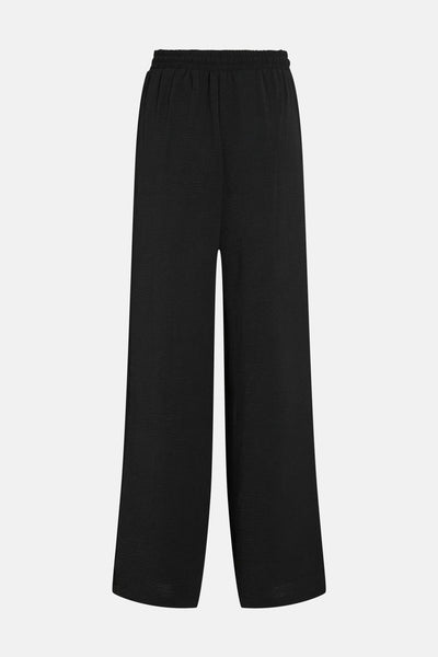 Pantalon noir ample de VILA, avec taille élastique et texture subtile.