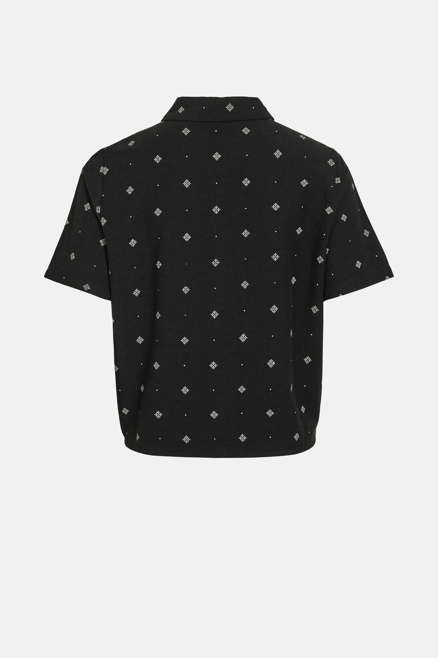 Zwart T-shirt met korte mouwen van VILA® met een wit geometrisch patroon over het geheel.