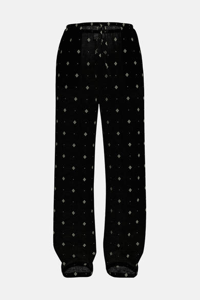 Zwarte broek met patroon van VILA®, met wit ruitpatroon over de gehele stof.