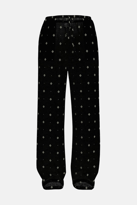 Zwarte broek met patroon van VILA®, met wit ruitpatroon over de gehele stof.