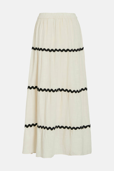 Jupe longue beige de VILA® avec des détails à volants noirs et une taille élastiquée.