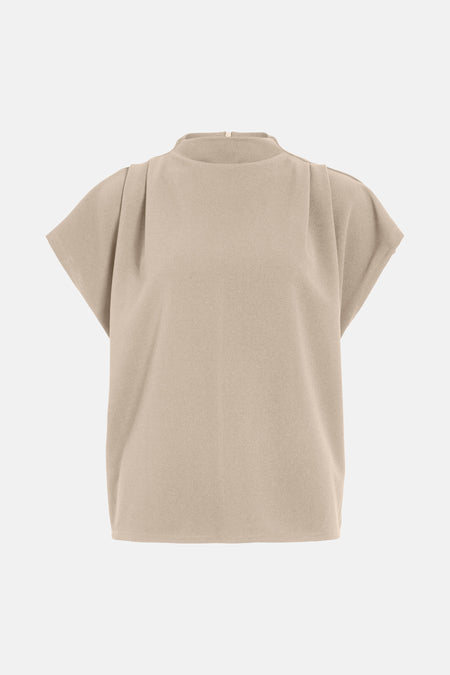 Blouse beige à manches courtes de VILA, avec col montant et plis structurés aux épaules.