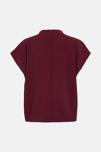 Blouse bordeaux à manches courtes de VILA®, avec fermeture éclair discrète au dos.
