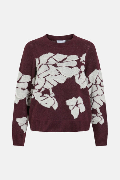 Bordeaux trui met ronde hals van VILA®, met een wit bloemenpatroon op de rug en lange mouwen.