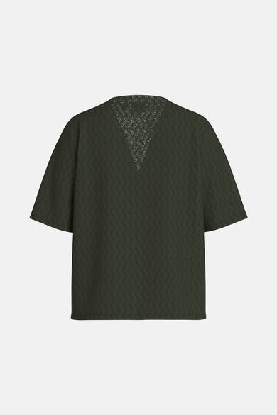 Blouse à manches courtes verte de VILA®, avec détails en dentelle au dos et motif texturé.
