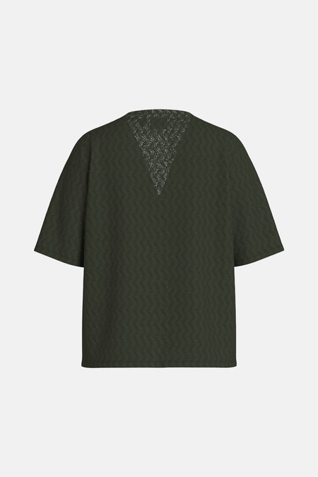 Blouse à manches courtes verte de VILA®, avec détails en dentelle au dos et motif texturé.
