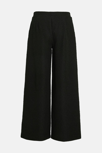 Pantalon noir de VILA®, ample et texturé, avec une coupe palazzo confortable.