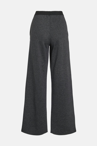 Pantalon noir de VILA, coupe large, avec ceinture côtelée et texture chinée.