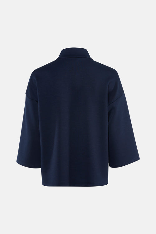 Sweat bleu de VILA®, avec un col montant et des manches trois-quarts amples, présenté de dos.
