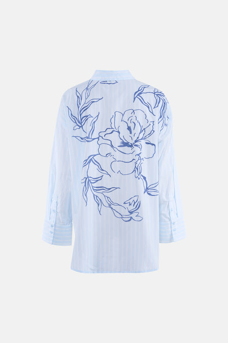 Chemise à manches longues bleue à rayures par VILA®, avec un grand motif floral sur le dos.
