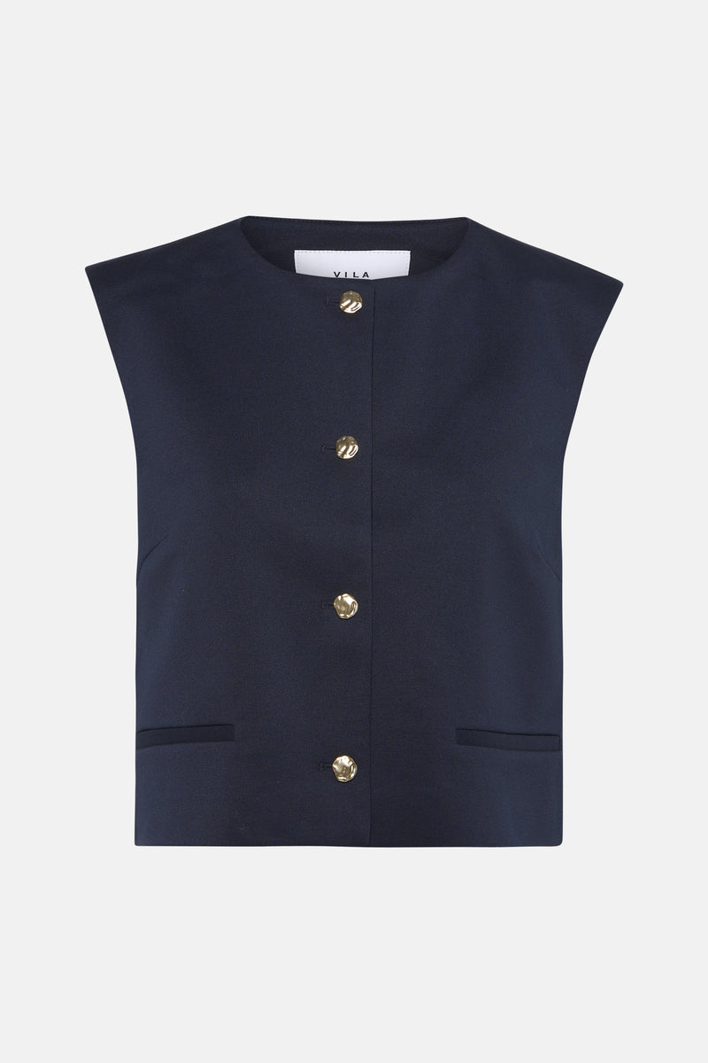 Blazer bleu marine par VILA®, avec une fermeture boutonnée dorée et de fausses poches passepoilées.
