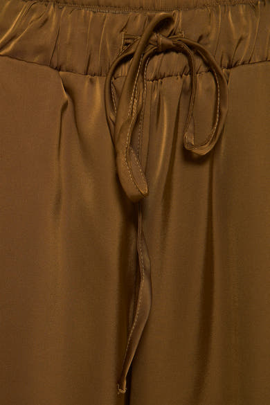 Pantalon doré de VILA, avec cordon de serrage à la taille élastiquée et texture satinée.
