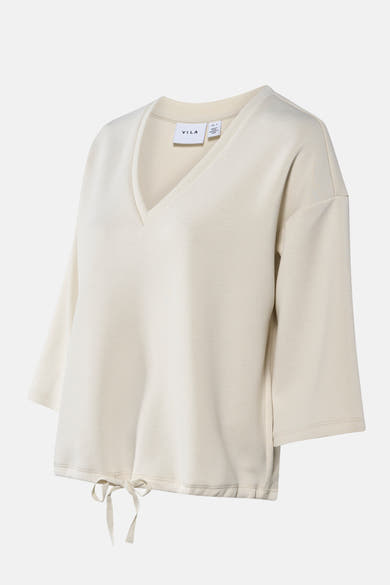 Sweat beige uni de VILA, avec cordon de serrage à la taille et col en V.