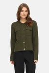 Olive green knit cardigan with collar, front buttons, and two chest pockets, worn with black pants, front view.