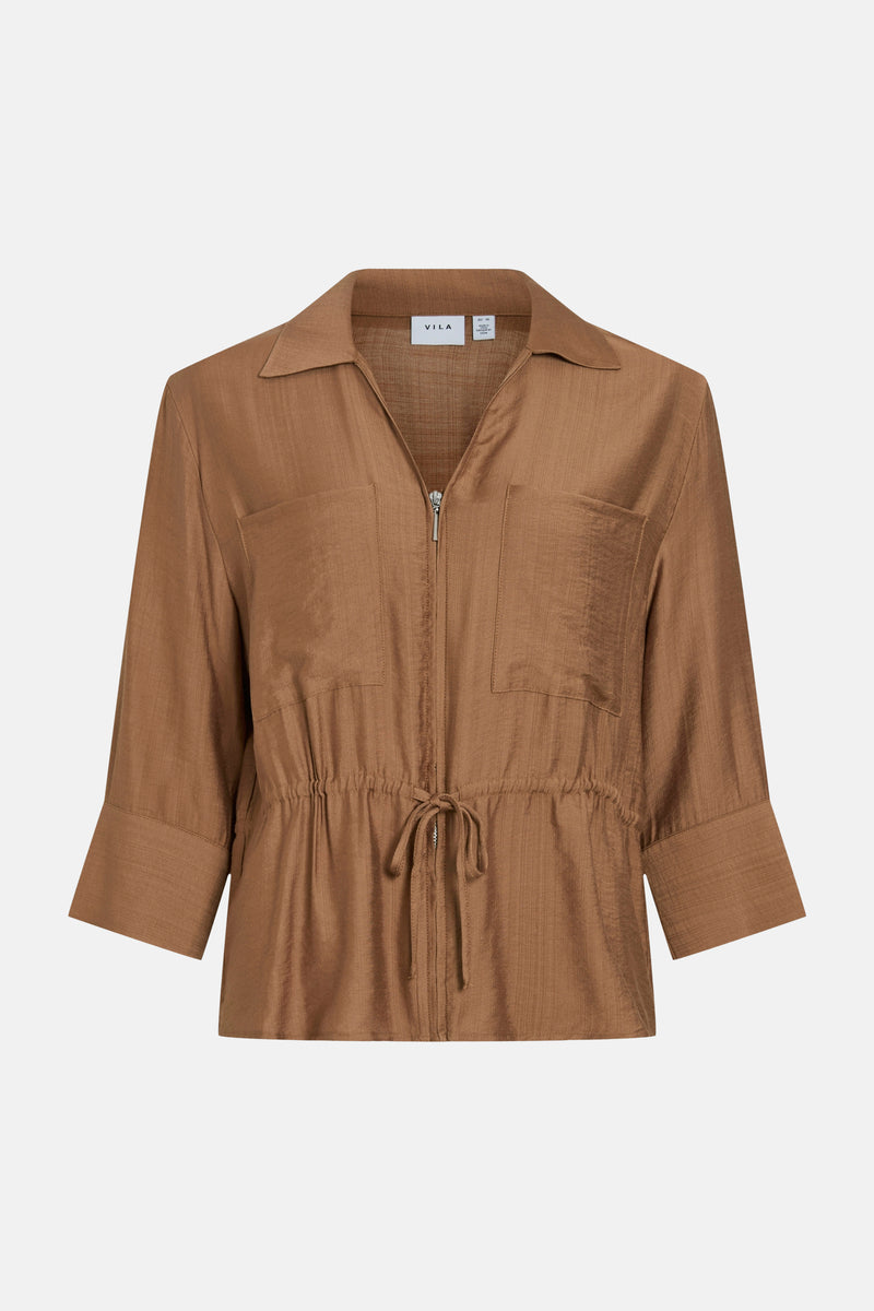Tan 3/4-sleeve blouse with front zipper and drawstring waist by VILA, featuring two chest pockets and a collared neckline, shown in front view.