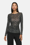 Black long-sleeve T-shirt with snakeskin print and ruched waist, front view on model wearing black pants