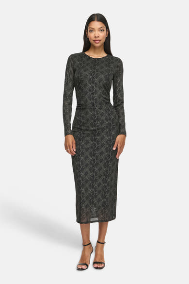 Black long-sleeve midi dress with snakeskin pattern, form-fitting silhouette, round neckline, and sheer fabric texture, shown on model in front view.