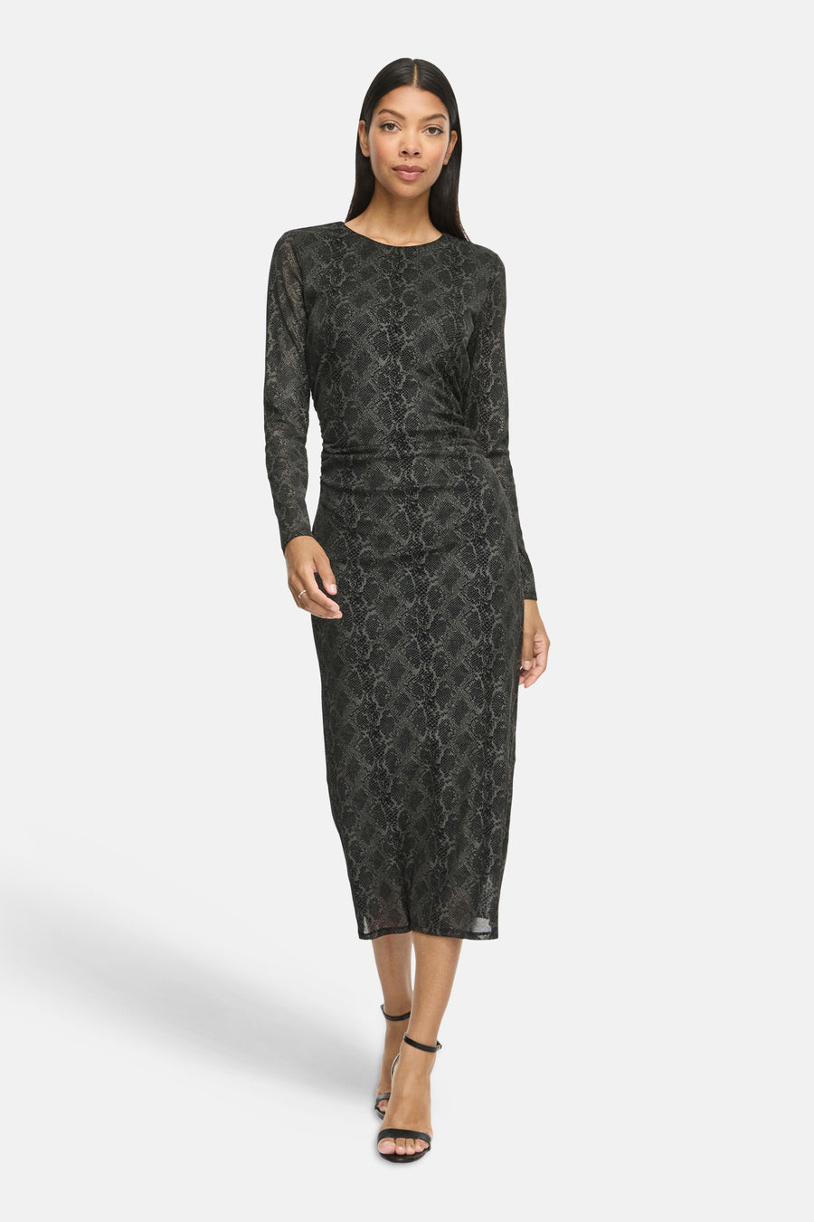 Black long-sleeve snake print midi dress with round neckline and fitted silhouette, worn with black strappy heels, front view