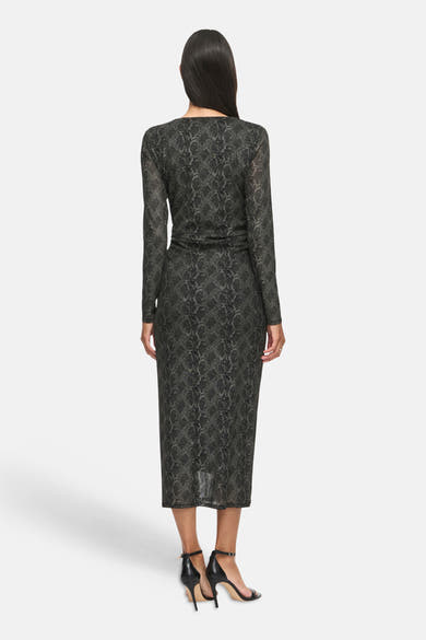 Black long-sleeve snake print midi dress by Black Beauty, back view, sheer textured fabric, wrap waist, model wears black heels
