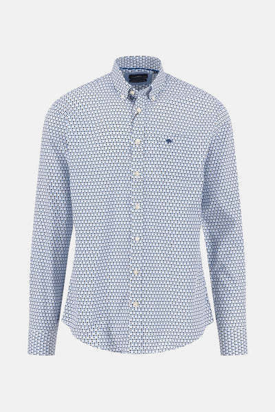 Chemise à manches longues bleue de FYNCH-HATTON avec motif à pois et boutons blancs.