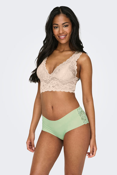 Beige bh van ONLY, met bloemorn dentelle, gedragen met een bijpassende groene kledingstuk.