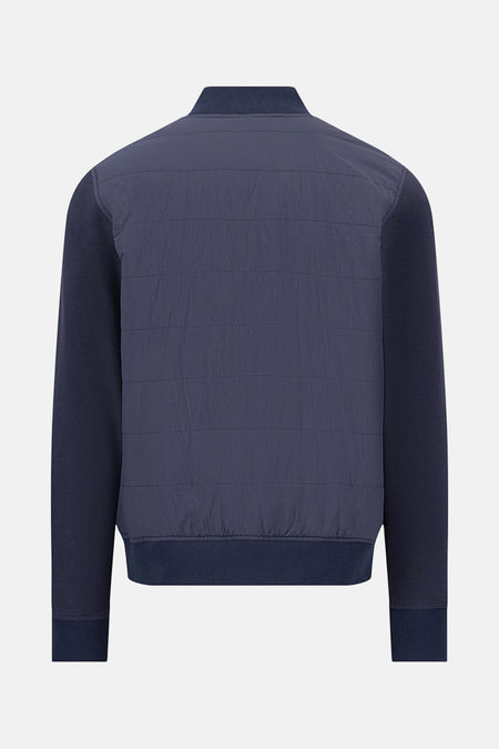 Veste bleue de FYNCH-HATTON avec corps matelassé et manches en tricot, vue de dos.