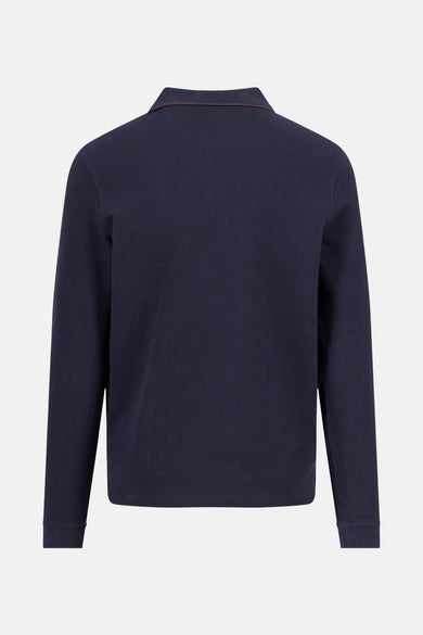 Polo à manches longues bleu de FYNCH-HATTON, présentant une coupe classique et des détails subtils au col.