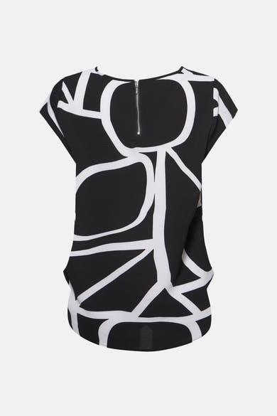 Blouse noire à manches courtes de ONLY, à motif géométrique blanc et fermeture éclair au dos.