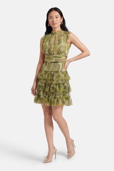 Robe courte verte de GOA GOA, à motif feuillage et jupe à volants.