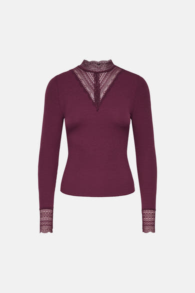 Fig long-sleeve ribbed top with lace V-neck and cuffs, front view
