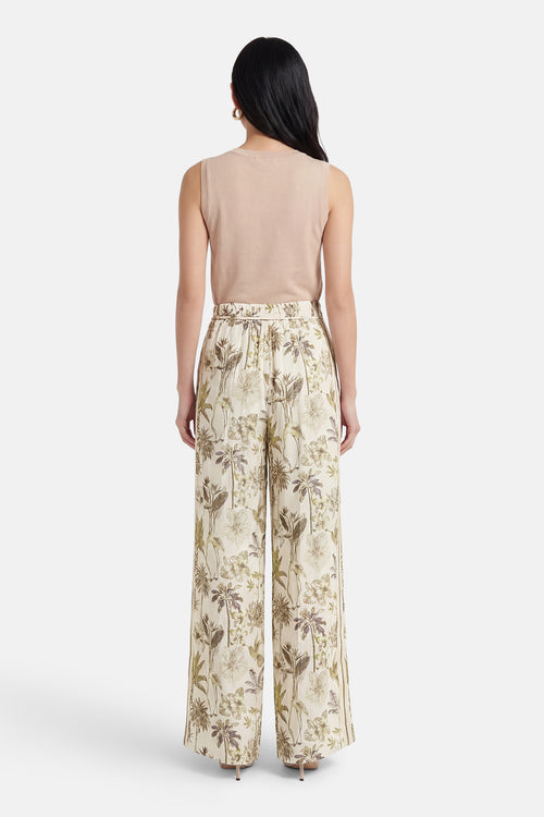 Pantalon de costume multicolore de GOA GOA, à motif floral tropical, coupe ample et jambes larges.