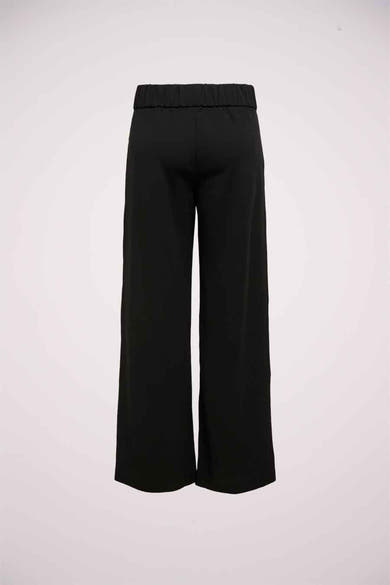 Pantalon de tailleur noir par JDY, avec une taille élastique et une coupe ample.