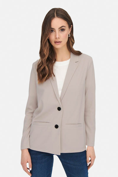 Beige blazer van JDY, met zwarte dubbele knoopsluiting en voorzakken.