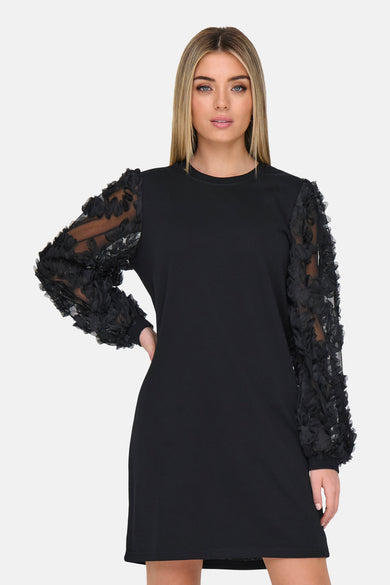 Robe noire à manches longues de JDY, avec manches transparentes décorées de fleurs noires en relief.