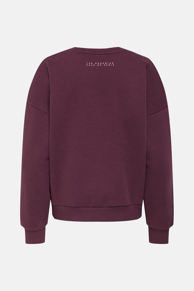 Sweat-shirt bordeaux par ONLY, avec l'inscription "The Bohemian Face of Paris" dans le dos.