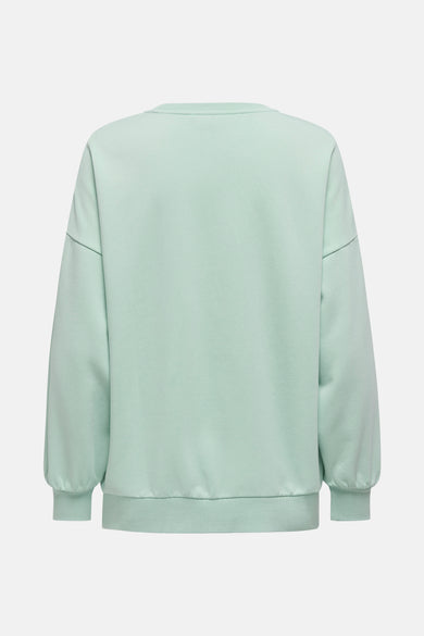 Sweat-shirt vert de ONLY, manches longues amples et ourlet côtelé, sur fond uni.
